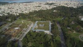 5K aerial stock footage of orbiting the California Academy of Sciences in iconic Golden Gate Park, San Francisco, California Aerial Stock Footage | DFKSF06_057