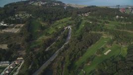 5K aerial stock footage fly over highway to MacArthur Tunnel and The Presidio Golf Course, San Francisco, California Aerial Stock Footage | DFKSF06_082