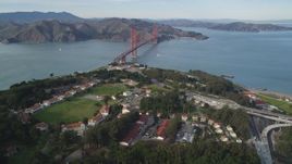 5K aerial stock footage of flying over The Presidio, tilt to reveal the famous Golden Gate Bridge, San Francisco, California Aerial Stock Footage | DFKSF06_084