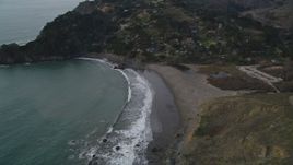 5K aerial stock footage of flying by Muir Beach and hillside home on the coast, Marin County,  California Aerial Stock Footage | DFKSF06_103