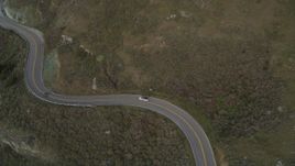 5K aerial stock footage track silver convertible on Highway 1, Marin County, California Aerial Stock Footage | DFKSF06_110