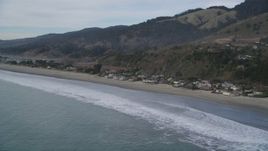 5K aerial stock footage of flying by beachfront homes and coastal hills, Stinson Beach, California Aerial Stock Footage | DFKSF06_115