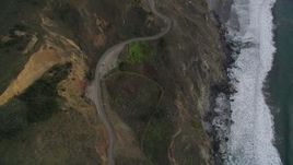 5K aerial stock footage video of following Highway 1 coastal road winding above cliffs, Marin County, California Aerial Stock Footage | DFKSF06_149