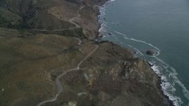 5K aerial stock footage of flying over Highway 1 winding around coastal cliffs, Marin County, California Aerial Stock Footage | DFKSF06_151