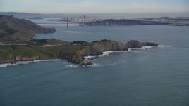 5K aerial stock footage tilt from Marin Headlands revealing Golden Gate Bridge, San Francisco, California Aerial Stock Footage | DFKSF06_155