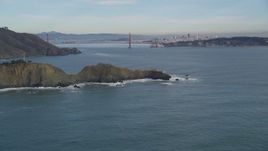 5K aerial stock footage of a view of the Marin Headlands coastal cliffs and iconic Golden Gate Bridge, Marin County, California Aerial Stock Footage | DFKSF06_157