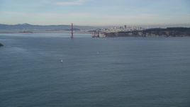 5K aerial stock footage of approaching the famous and iconic Golden Gate Bridge, with downtown in the distance, San Francisco, California Aerial Stock Footage | DFKSF06_159