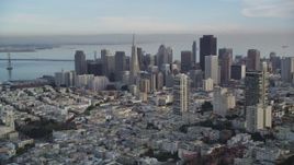 5K aerial stock footage pan from Coit Tower and Bay Bridge to Downtown San Francisco skyscrapers, California Aerial Stock Footage | DFKSF06_169