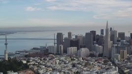 5K aerial stock footage of Coit Tower, Transamerica Pyramid and skyscrapers, Bay Bridge, Downtown San Francisco, California Aerial Stock Footage | DFKSF06_174