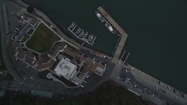 5K aerial stock footage fly over Yerba Buena Island, tilt to bird's eye of Coast Guard Station, San Francisco, California Aerial Stock Footage | DFKSF06_183