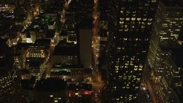5K aerial stock footage follow Pine Street past skyscrapers to apartment buildings in Downtown San Francisco, California, night Aerial Stock Footage | DFKSF07_014