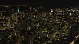 5K aerial stock footage flyby Transamerica Pyramid and over skyscrapers, Downtown San Francisco, California, night Aerial Stock Footage | DFKSF07_016