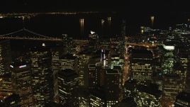 5K aerial stock footage of flying over skyscrapers to approach the bay, Downtown San Francisco, California, night Aerial Stock Footage | DFKSF07_017