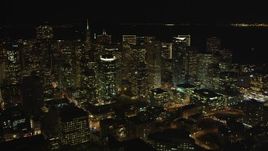 5K aerial stock footage tilt from I-80 freeway to reveal skyscrapers in Downtown San Francisco, California, night Aerial Stock Footage | DFKSF07_019