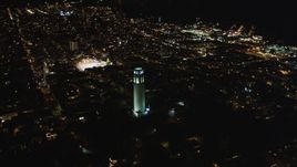 5K aerial stock footage of flying by Coit Tower in North Beach, San Francisco, California, night Aerial Stock Footage | DFKSF07_020