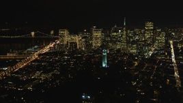 5K aerial stock footage of Coit Tower and the city's skyscrapers, Downtown San Francisco, California, night Aerial Stock Footage | DFKSF07_022