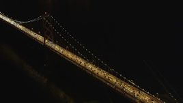 5K aerial stock footage approach and pan across heavy Bay Bridge traffic, Downtown San Francisco, California, night Aerial Stock Footage | DFKSF07_025