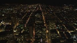 5K aerial stock footage of approaching 555 California Street skyscraper, Downtown San Francisco, California, night Aerial Stock Footage | DFKSF07_029