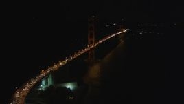 5K aerial stock footage of flying over heavy traffic to approach the Golden Gate Bridge, San Francisco, California, night Aerial Stock Footage | DFKSF07_035