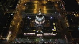 5K aerial stock footage of tilting to a bird's eye view of city hall and plaza at Civic Center, San Francisco, California, night Aerial Stock Footage | DFKSF07_053
