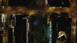 5K aerial stock footage of a bird's eye view of Civic Center plaza, museum and library, San Francisco, California, night Aerial Stock Footage | DFKSF07_054