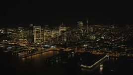 5K aerial stock footage of flying away from the city's skyscrapers, Downtown San Francisco, California, night Aerial Stock Footage | DFKSF07_057