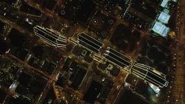 5K aerial stock footage of a bird's eye view of Embarcadero Center skyscrapers, Downtown San Francisco, California, night Aerial Stock Footage | DFKSF07_068