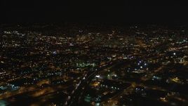 5K aerial stock footage of flying over I-880 freeway toward Downtown Oakland, California, night Aerial Stock Footage | DFKSF07_080