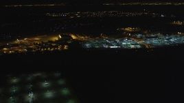 5K aerial stock footage of flying by Oakland International Airport, Oakland, California, night Aerial Stock Footage | DFKSF07_090