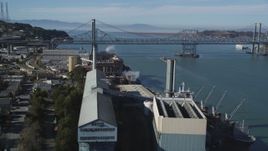 5K aerial stock footage of flying over C&H Pure Cane Sugar Factory to approach Carquinez Bridge, Crockett, California Aerial Stock Footage | DFKSF08_039
