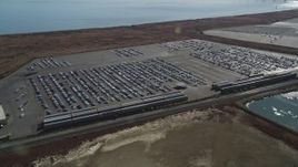 5K aerial stock footage of cars at the Valero Oil Refinery parking lot, Benicia, California Aerial Stock Footage | DFKSF08_049