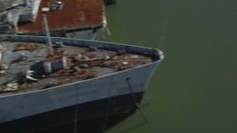 5K aerial stock footage pan across a warship, National Defense Reserve Fleet, Suisun Bay, California Aerial Stock Footage | DFKSF08_055