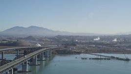 5K aerial stock footage pan from the Benicia-Martinez Bridge to the Shell Oil Refinery, California Aerial Stock Footage | DFKSF08_058