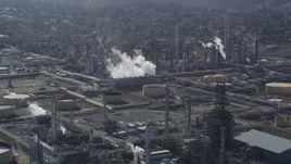5K aerial stock footage of passing by the Shell Oil Refinery, Martinez, California Aerial Stock Footage | DFKSF08_062