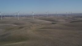 5K aerial stock footage of approaching the windmills at Shiloh Wind Power Plant, Montezuma Hills, California Aerial Stock Footage | DFKSF08_073