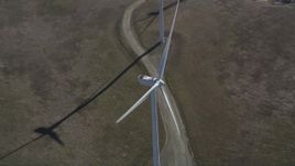 5K aerial stock footage flyby and away from a windmill at Shiloh Wind Power Plant, Montezuma Hills, California Aerial Stock Footage | DFKSF08_075