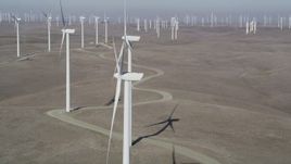 5K aerial stock footage of flying by windmills at the Shiloh Wind Power Plant, Montezuma Hills, California Aerial Stock Footage | DFKSF08_080