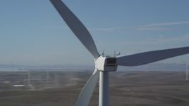 5K aerial stock footage of circling the top of windmill, Shiloh Wind Power Plant, Montezuma Hills, California Aerial Stock Footage | DFKSF08_091