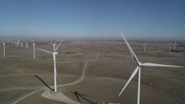 5K aerial stock footage passing windmills at Shiloh Wind Power Plant, Montezuma Hills, California Aerial Stock Footage | DFKSF08_095