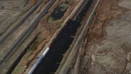 5K aerial stock footage of a train traveling through Bay Point, California Aerial Stock Footage | DFKSF08_108