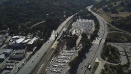 5K aerial stock footage fly over Highway 24 freeway, track a BART station and parking lots, Orinda, California Aerial Stock Footage | DFKSF09_007