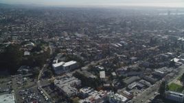 5K aerial stock footage of panning across urban neighborhoods to reveal Broadway, Oakland, California Aerial Stock Footage | DFKSF09_012