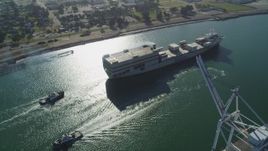 5K aerial stock footage of tracking a cargo ship in the Port of Oakland, California Aerial Stock Footage | DFKSF09_019