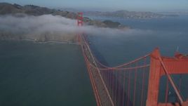 5K aerial stock footage of a view of the fog-shrouded Marin side of the Golden Gate Bridge in San Francisco, California Aerial Stock Footage | DFKSF09_032