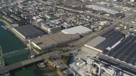 5K aerial stock footage of flying away from factories and warehouses in Oakland, Alameda, California Aerial Stock Footage | DFKSF09_060
