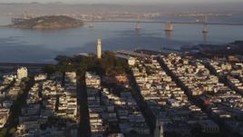 5K aerial stock footage of zooming in on Coit Tower in North Beach, San Francisco, California, sunset Aerial Stock Footage | DFKSF10_003