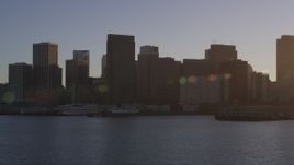 5K aerial stock footage of flying at low altitude by bayfront skyscrapers, Downtown San Francisco, California, sunset Aerial Stock Footage | DFKSF10_007