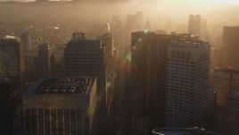 5K aerial stock footage of flying over Market Street through Downtown San Francisco, California, sunset Aerial Stock Footage | DFKSF10_010