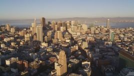 5K aerial stock footage of flying by city buildings and Market Street, Downtown San Francisco, California, sunset Aerial Stock Footage | DFKSF10_012
