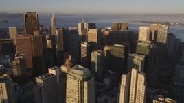 5K aerial stock footage approach and fly over skyscrapers in Downtown San Francisco, California, sunset Aerial Stock Footage | DFKSF10_015